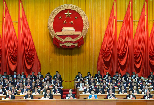 10月1日，慶祝中華人民共和國成立66周年暨新疆維吾爾自治區(qū)成立60周年大會在新疆人民會堂隆重舉行。 新華社記者 高潔 攝 