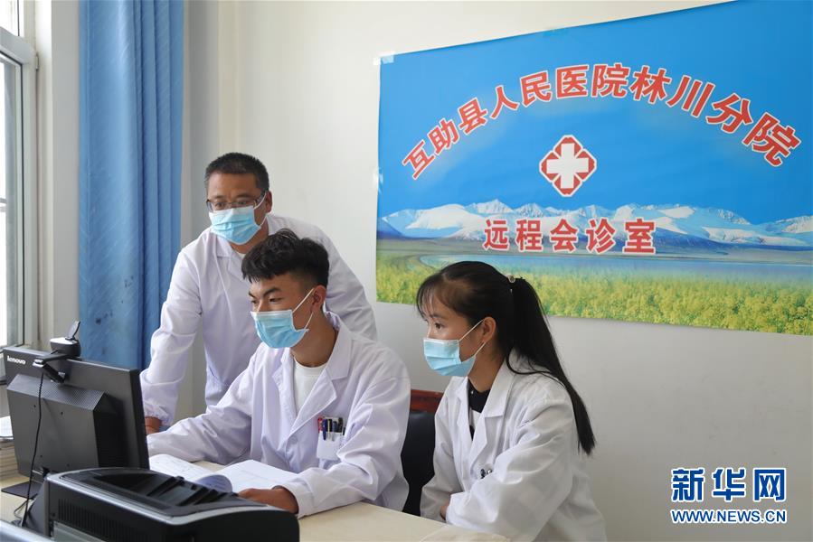 (圖文互動)(2)隔屏看專家 “醫共體”緩解看病難