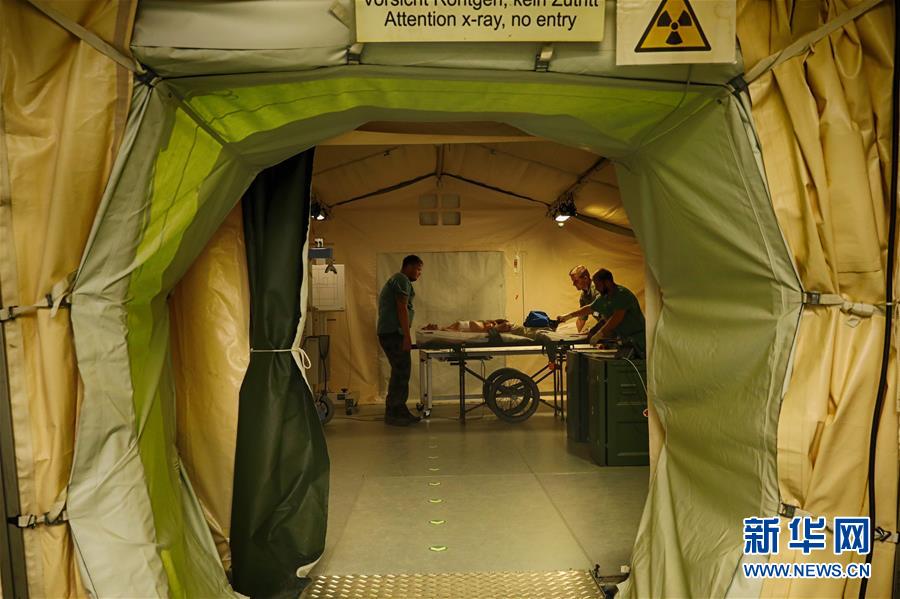(國際·圖文互動)(1)“共同的理念,讓合作更深入更順暢”——走進(jìn)中德“聯(lián)合救援-2019”衛(wèi)勤實兵聯(lián)合演習(xí)德方野戰(zhàn)二級醫(yī)院