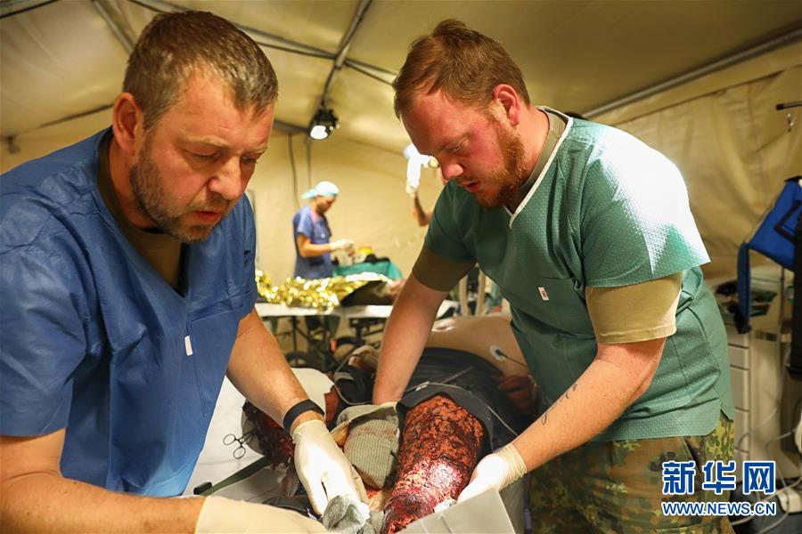(國際·圖文互動)(5)“共同的理念,讓合作更深入更順暢”——走進(jìn)中德“聯(lián)合救援-2019”衛(wèi)勤實兵聯(lián)合演習(xí)德方野戰(zhàn)二級醫(yī)院