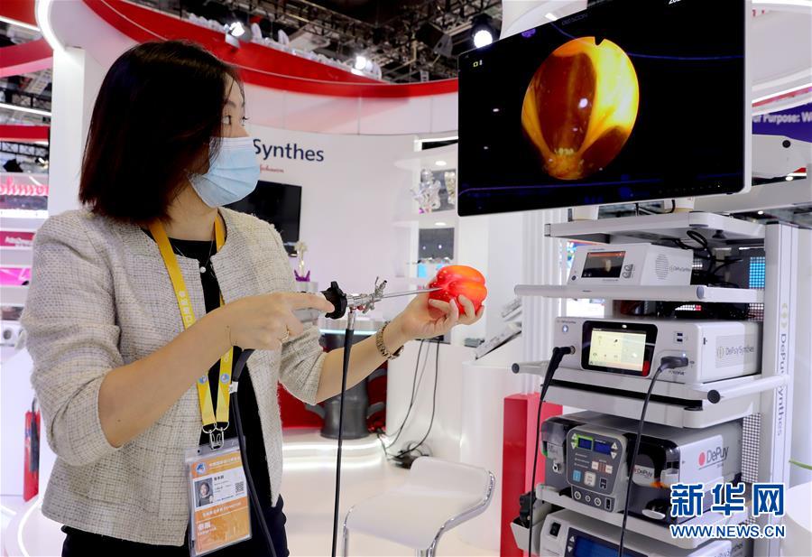 (第三屆進博會·圖文互動)(5)新疫苗、新療法,進博會最“火爆”展區(qū)見聞